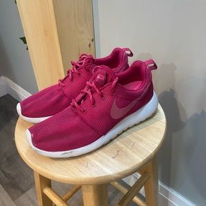 Red Nike running shoes